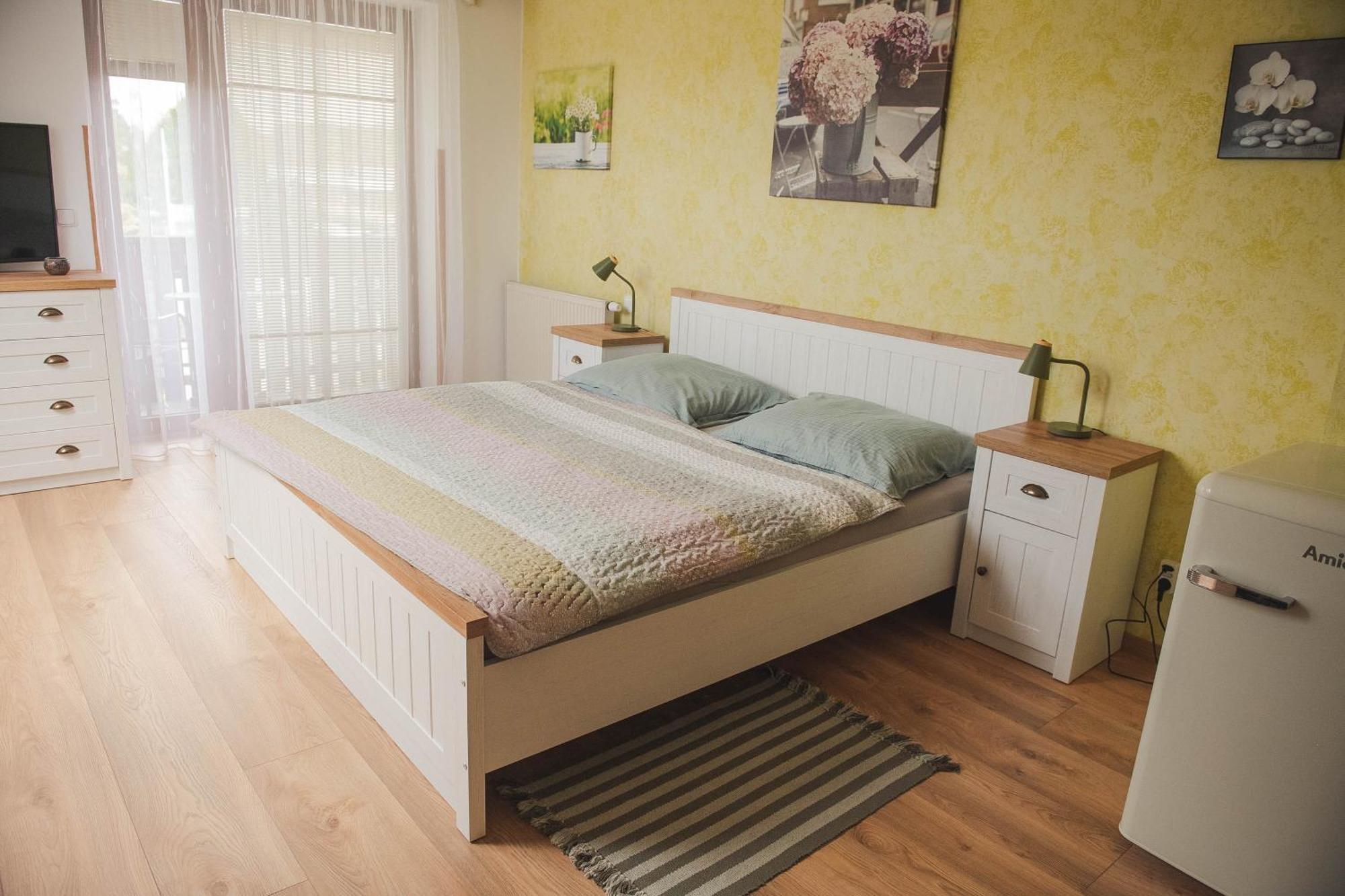 Dvoulůžkový pokoj Deluxe s manželskou postelí